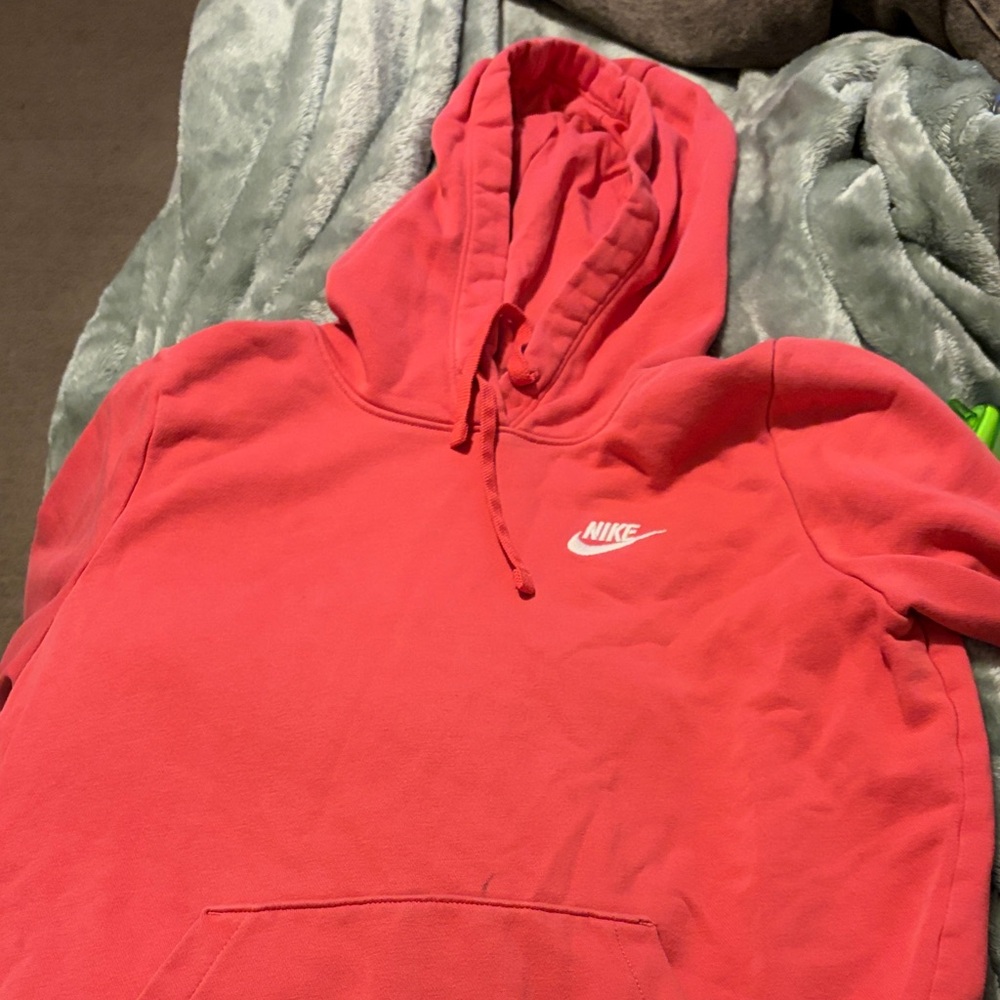 Nike pink hoodie
Little mark on the front above pocket